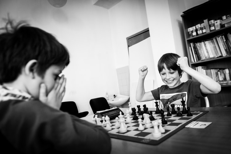 kid winning at chess