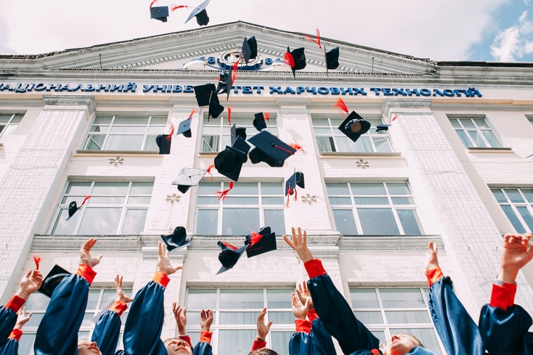 graduation cap throwing