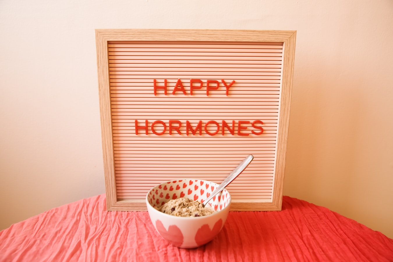 sign that reads "happy hormones"