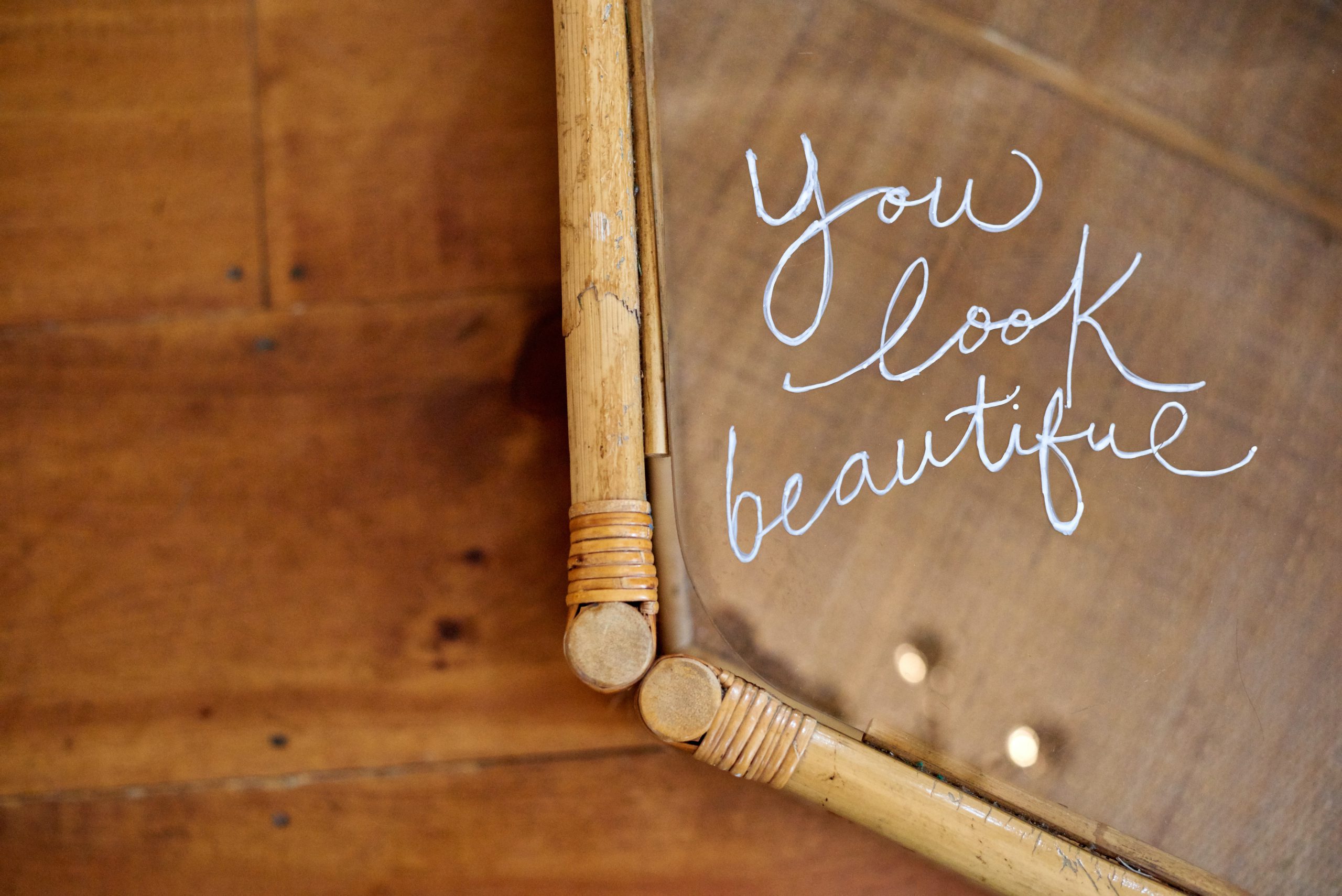 sign that reads 'you look beautiful"