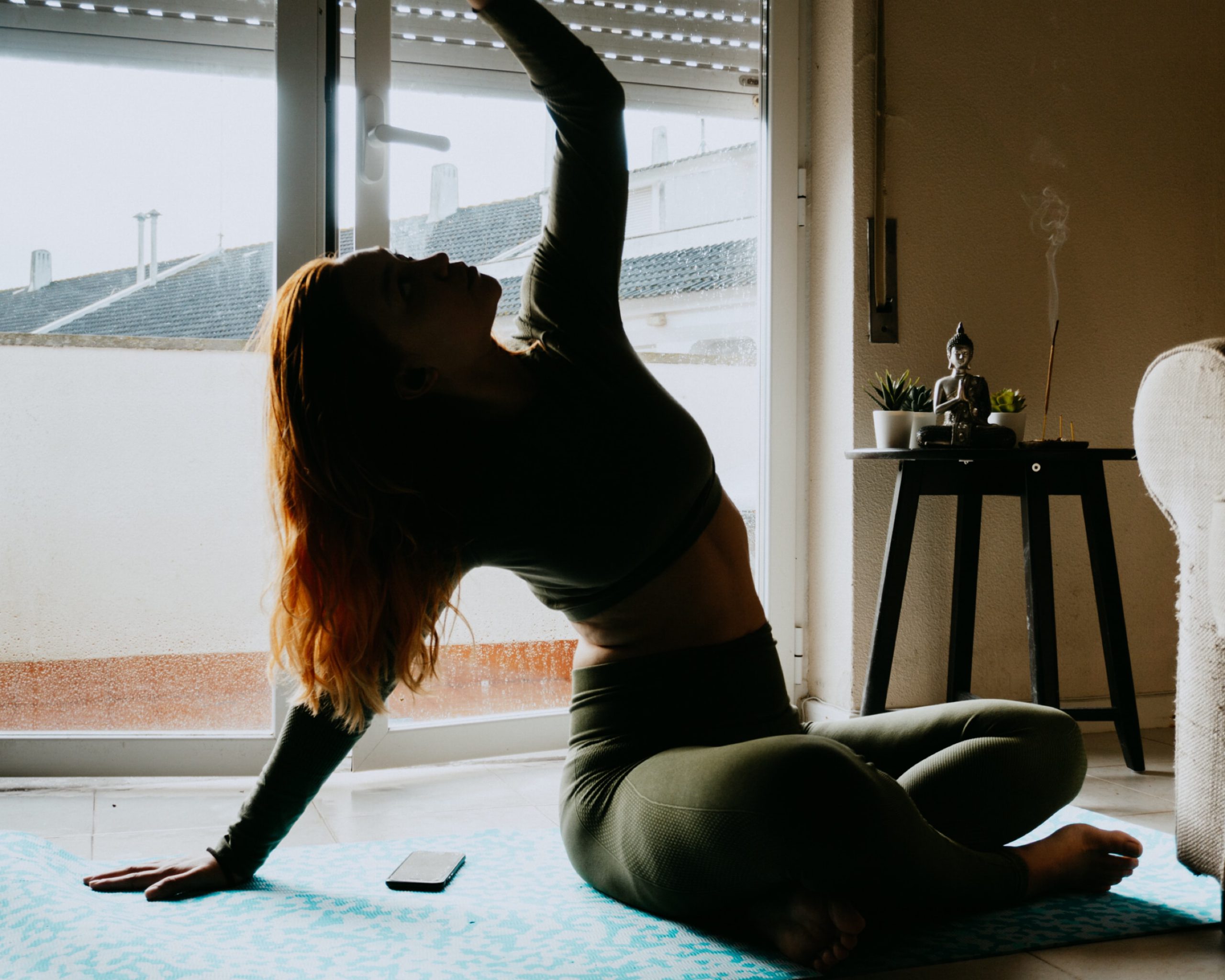 woman kneeling on the floor