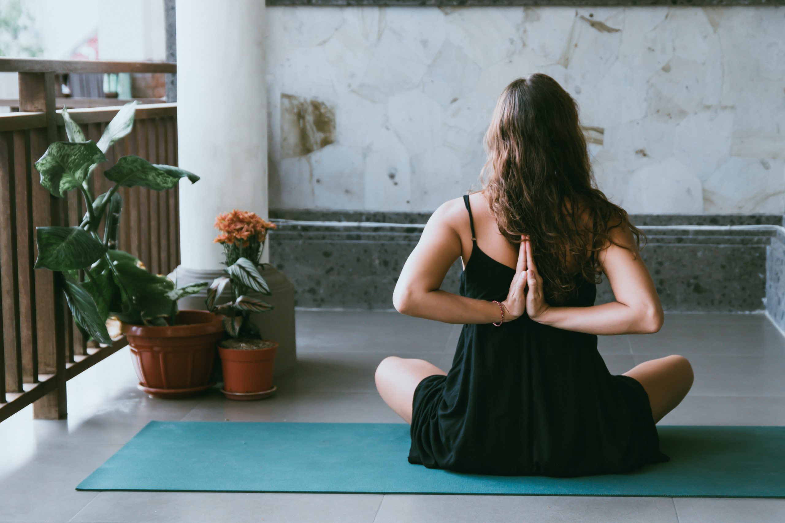 woman sitting yoga position