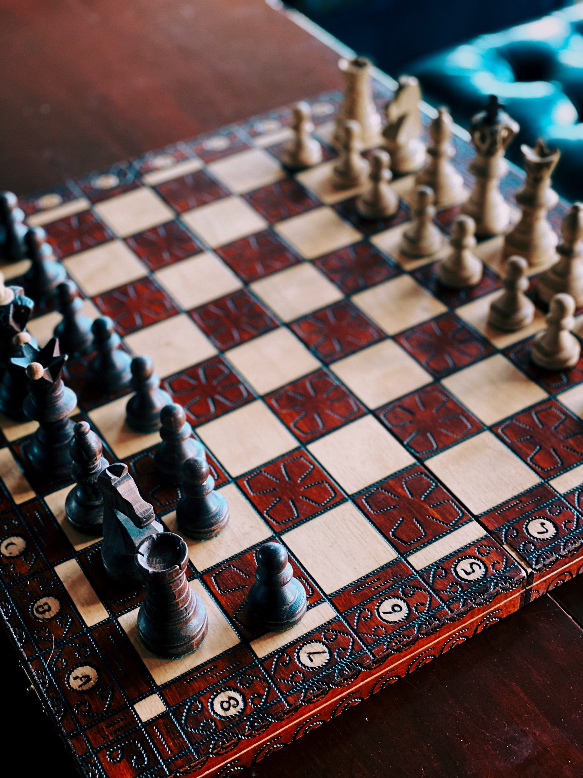 Wooden chess board with starting position