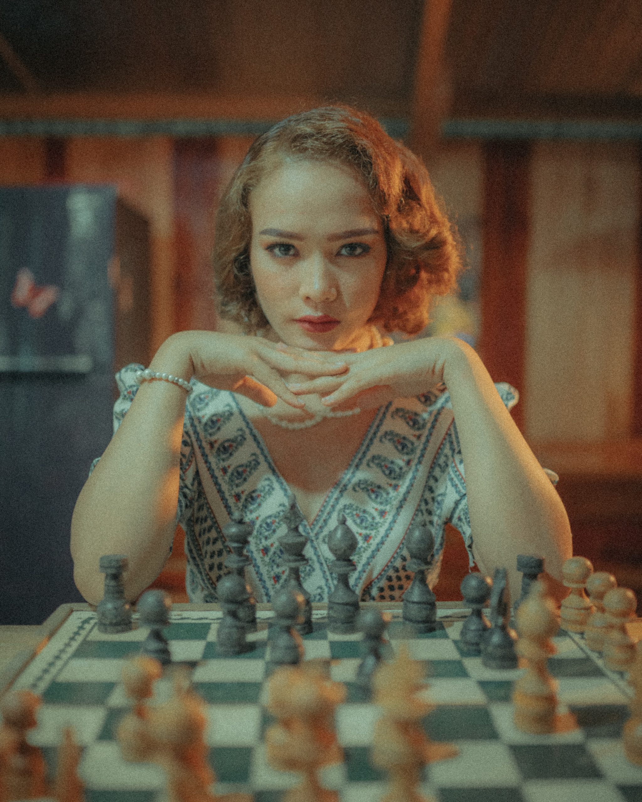 Meet the world's sexiest chess player who loves dressing up in