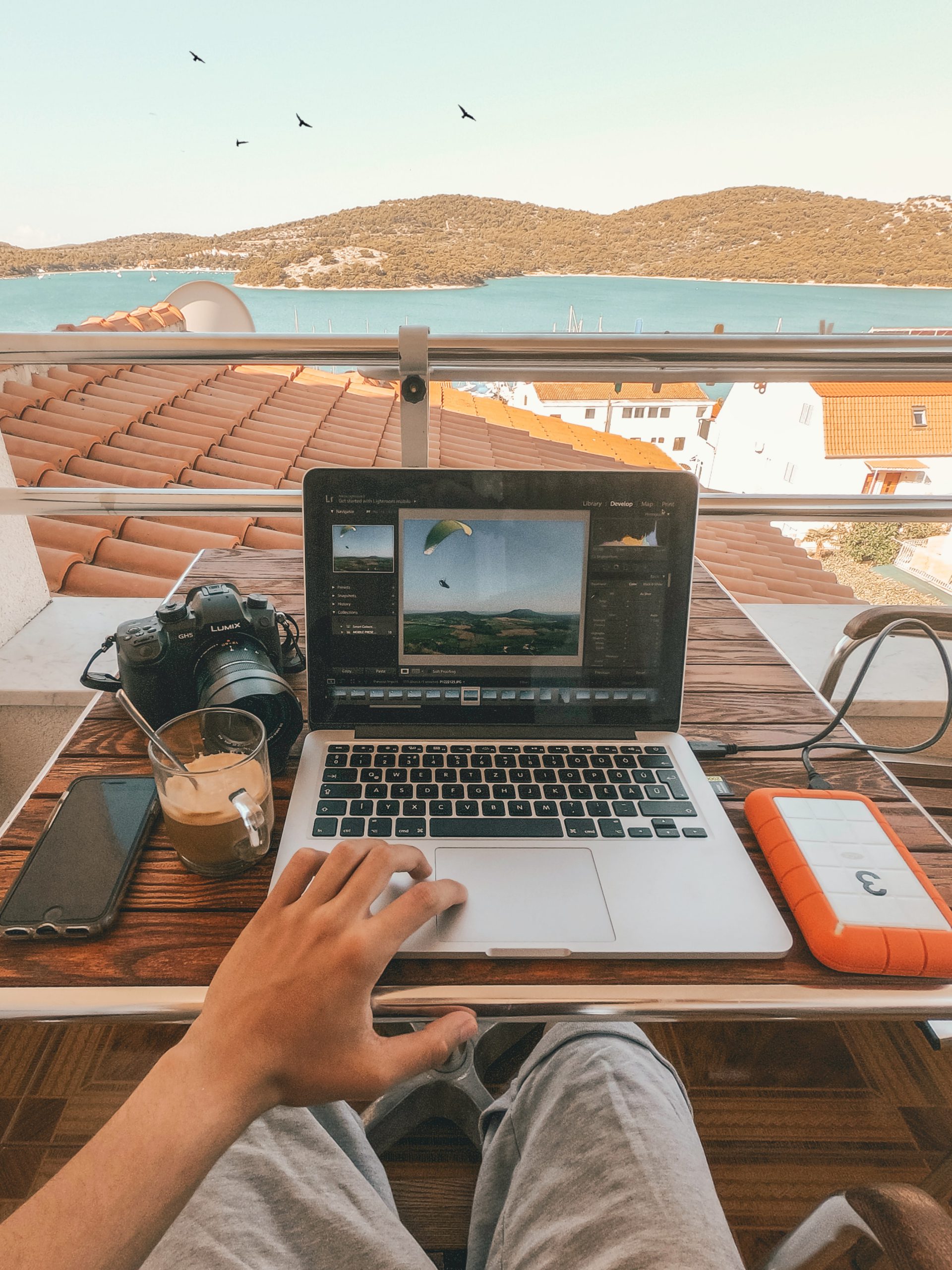 digital nomad working at laptop