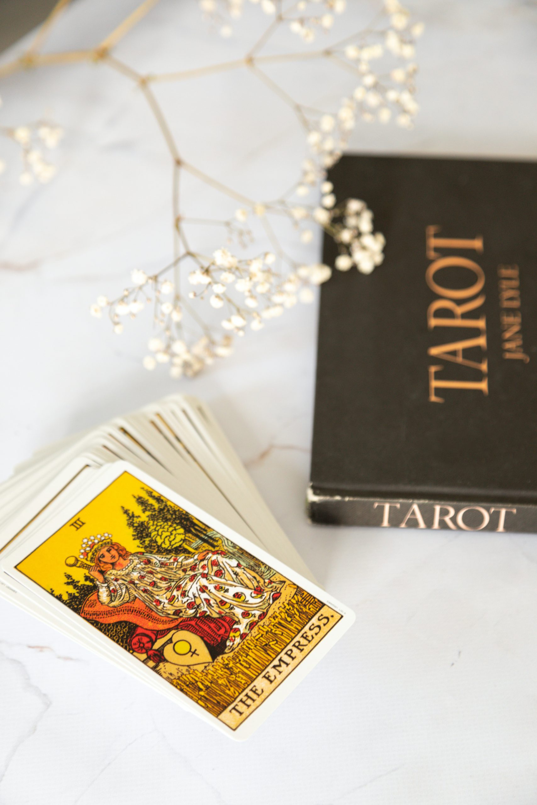 tarot cards and book on tarot