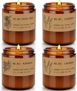 pack of four scented candles with brown glass