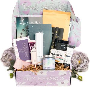 pink basket with soaps and lotions