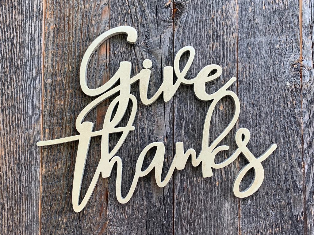 give thanks on wooden table