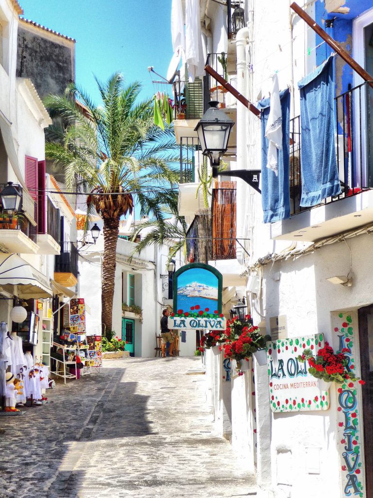 street in Ibiza Spain with blue and white buildings