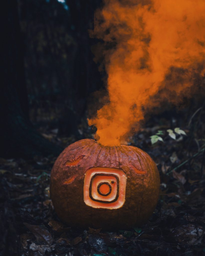 pumpkin carved with instagram logo
