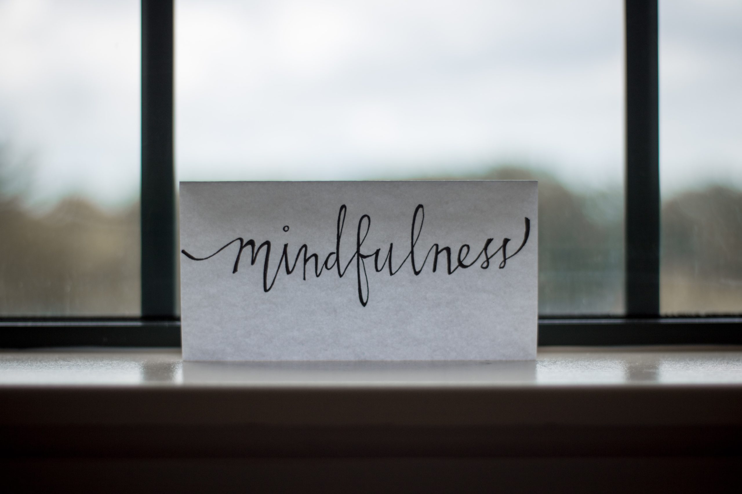 mindfulness written in front of a window