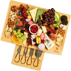 charcuterie board with meat, cheese, and fruit